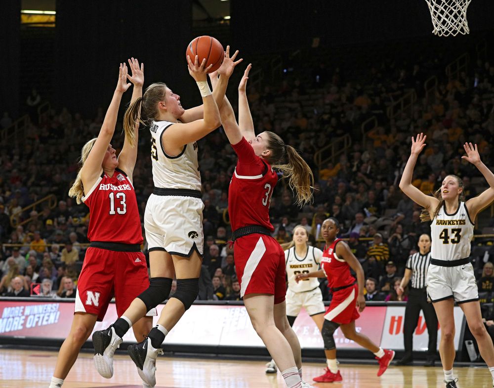 Iowa Hawkeyes forward Monika Czinano (25) puts up a shot during the fourth quarter of the game at Carver-Hawkeye Arena in Iowa City on Thursday, February 6, 2020. (Stephen Mally/hawkeyesports.com)