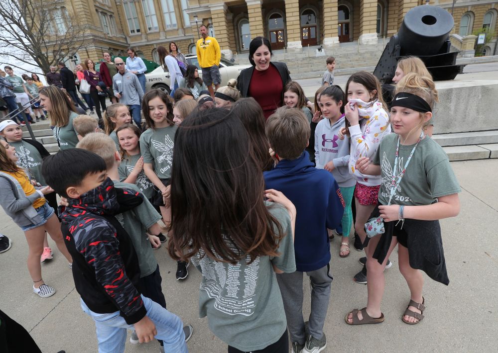 IowaÕs Megan Gustafson takes photos with a group of students on a field trip as she leaves the Iowa State Capitol Wednesday, April 24, 2019 in Des Moines. (Brian Ray/hawkeyesports.com)