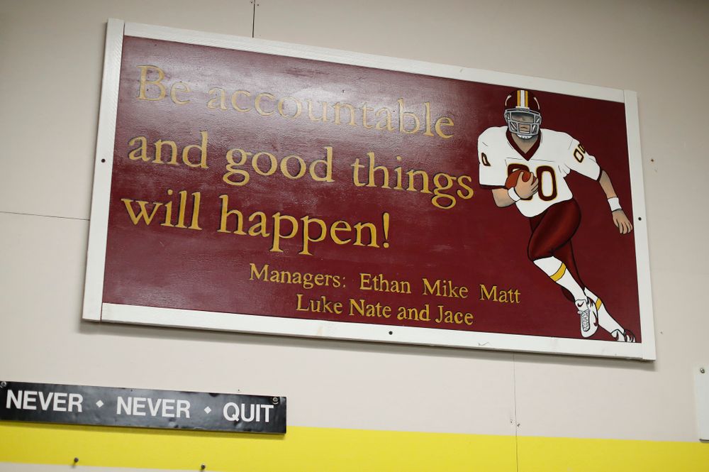 A sign created by Iowa Hawkeyes quarterback Nathan Stanley (4) and his fellow managers hangs in the weight room at his high school Wednesday, May 30, 2018 in Menomonie, Wisc. (Brian Ray/hawkeyesports.com)