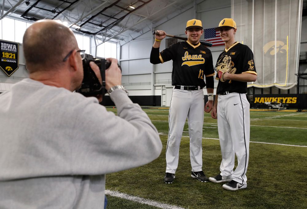 Iowa Hawkeyes catcher Matt Berst (13) and pitcher Zach Daniels (2) during the team's annual media day Thursday, February 8, 2018 in the indoor practice facility. (Brian Ray/hawkeyesports.com)