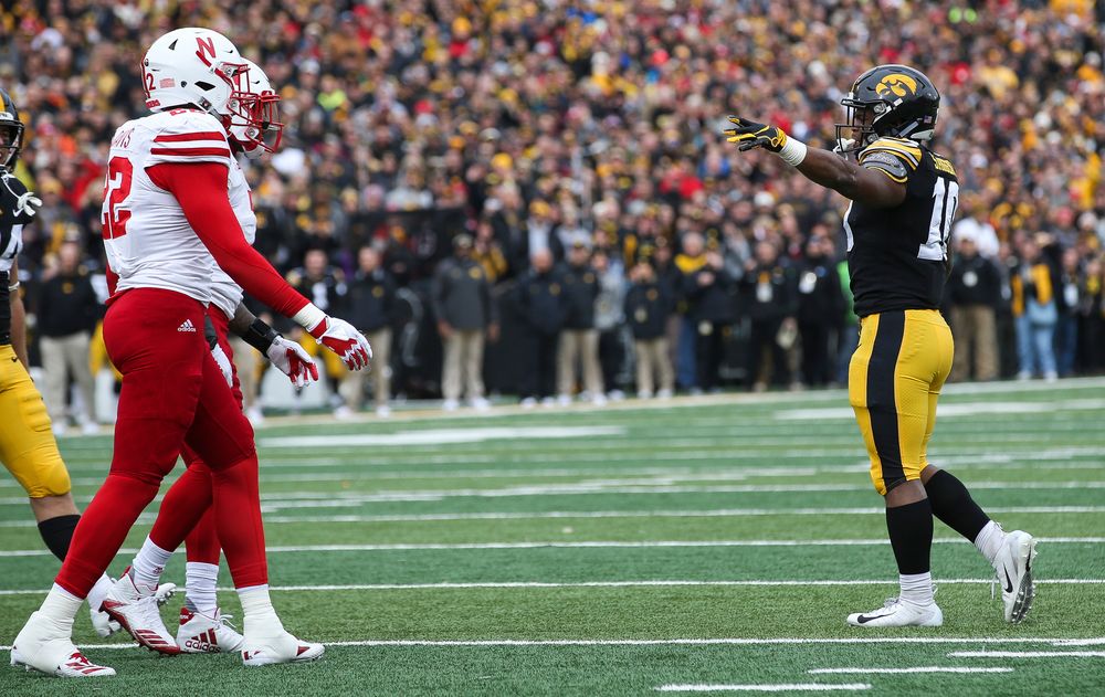 Iowa Hawkeyes running back Mekhi Sargent (10) signals for a first down