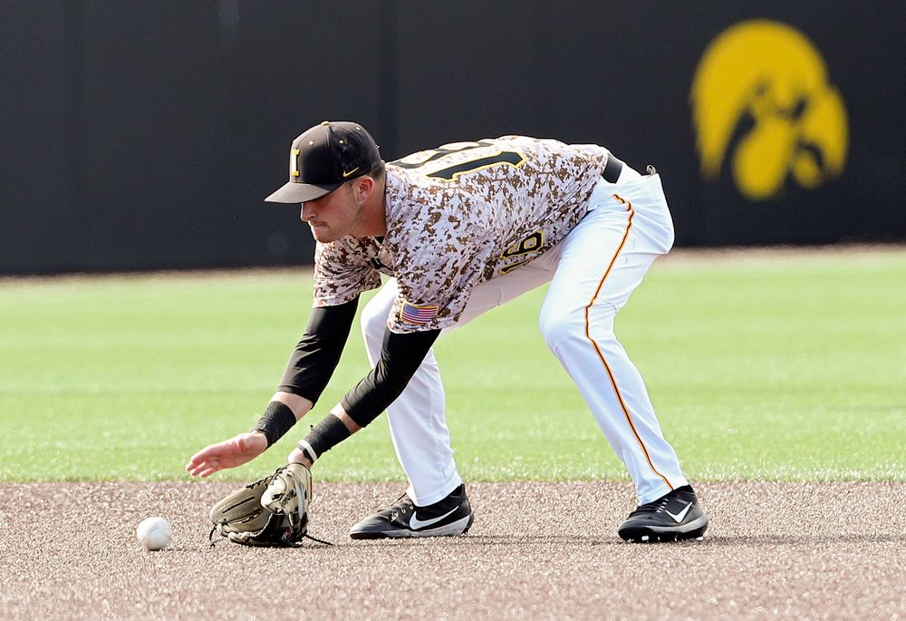 Iowa Hawkeyes shortstop Tanner Wetrich (16) fields a ground ball during the ninth inning of their game against UC Irvine at Duane Banks Field in Iowa City on Sunday, May. 5, 2019. (Stephen Mally/hawkeyesports.com)