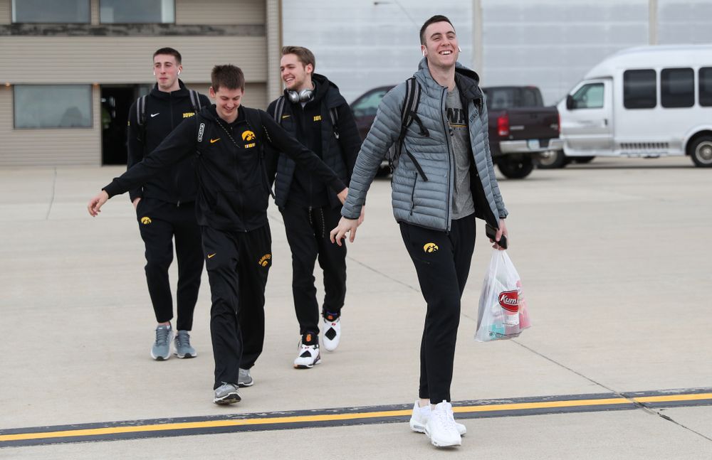 Iowa Hawkeyes guard Connor McCaffery (30) boards a flight to Columbus for the first and second rounds of the 2019 NCAA Men's Basketball Tournament Wednesday, March 20, 2019 at the Eastern Iowa Airport. (Brian Ray/hawkeyesports.com)