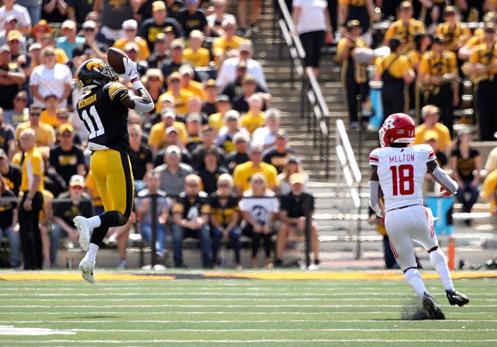 Iowa Hawkeyes defensive back Michael Ojemudia (11) pulls in an interception during the fourth quarter of their Big Ten Conference football game at Kinnick Stadium in Iowa City on Saturday, Sep 7, 2019. (Stephen Mally/hawkeyesports.com)