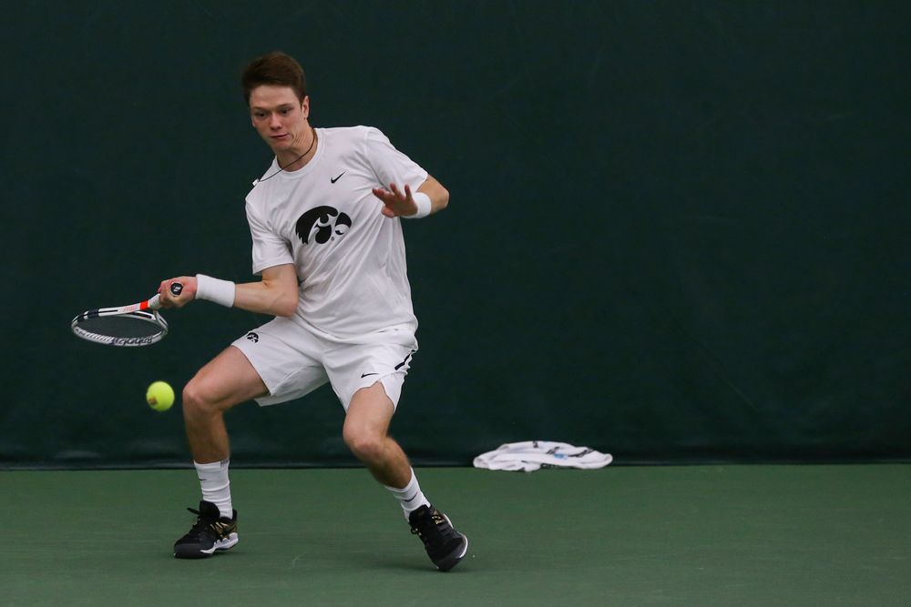 Iowa’s Jason Kerst hits a forehand during the Iowa men’s tennis match vs Western Michigan on Saturday, January 18, 2020 at the Hawkeye Tennis and Recreation Complex. (Lily Smith/hawkeyesports.com)