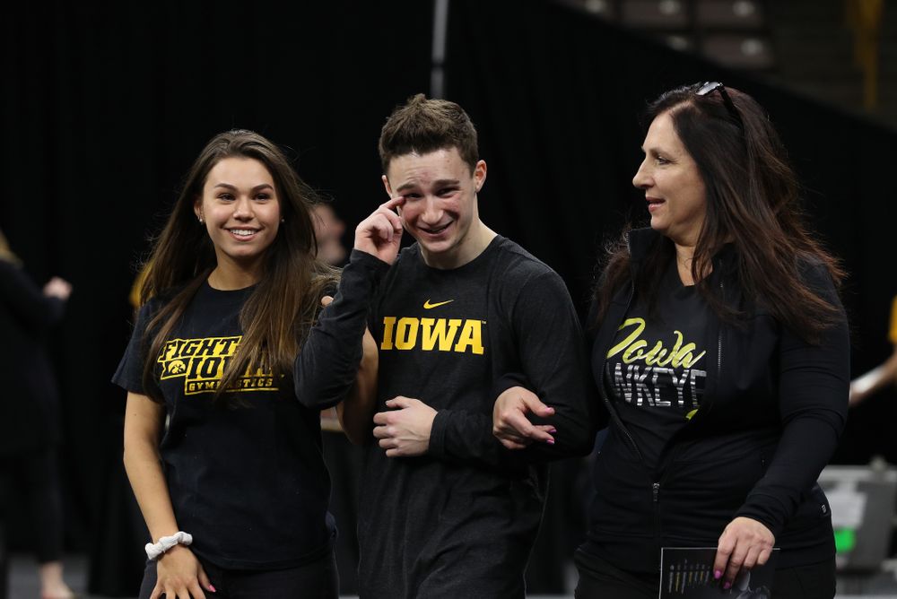 Iowa Men's Gymnast Jake Brodarzon and his family during senior day ceremonies following their meet against the Ohio State Buckeyes  Saturday, March 16, 2019 at Carver-Hawkeye Arena.  (Brian Ray/hawkeyesports.com)