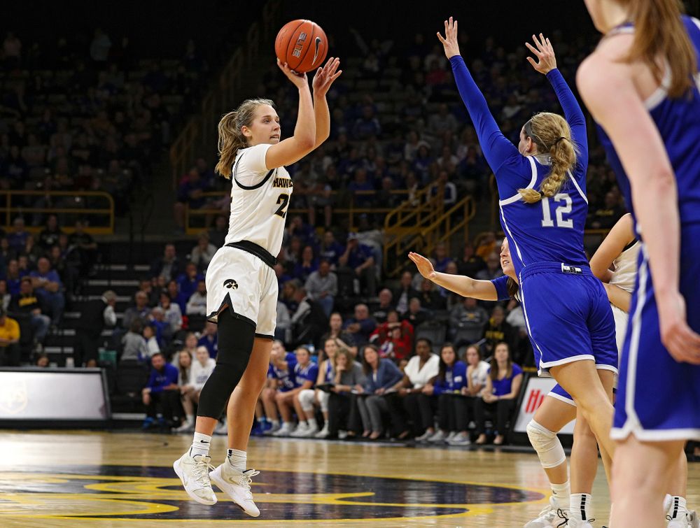 Iowa Hawkeyes guard Kathleen Doyle (22) makes a 3-pointer during the fourth quarter of their game at Carver-Hawkeye Arena in Iowa City on Saturday, December 21, 2019. (Stephen Mally/hawkeyesports.com)
