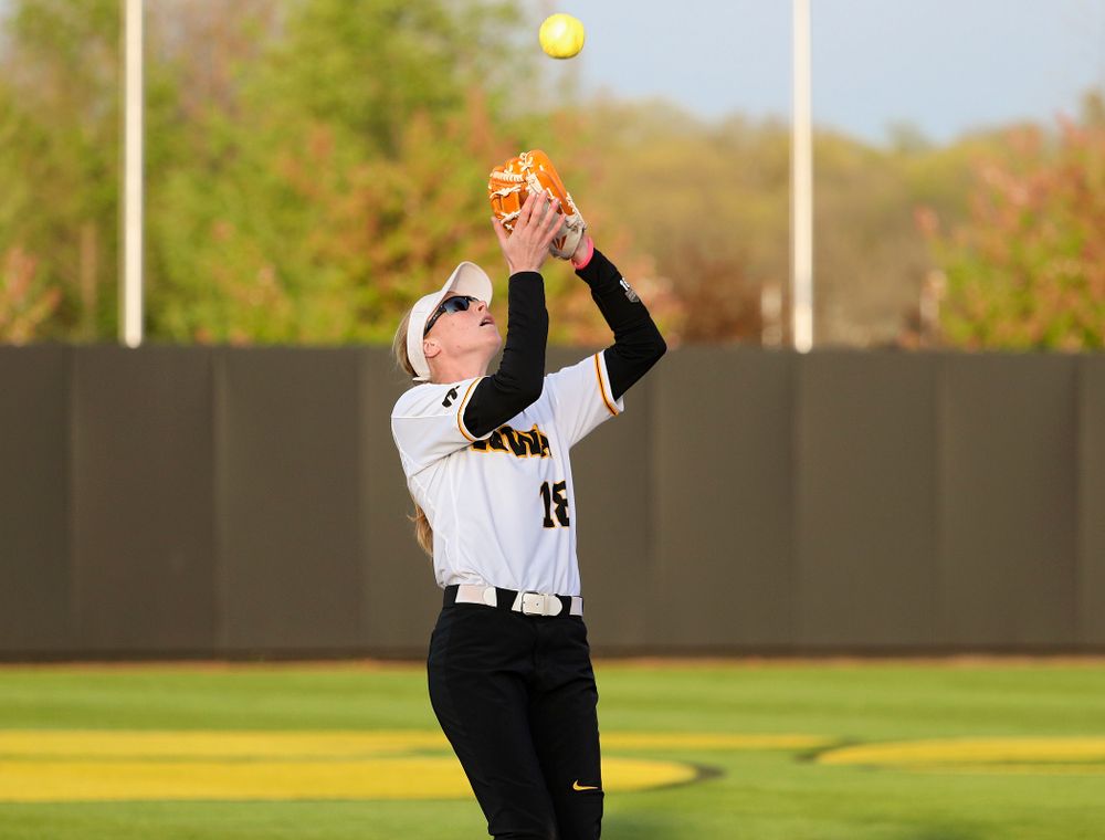 Iowa shortstop Ashley Hamilton (18) pulls in a pop up for an out during the seventh inning of their game against Ohio State at Pearl Field in Iowa City on Friday, May. 3, 2019. (Stephen Mally/hawkeyesports.com)