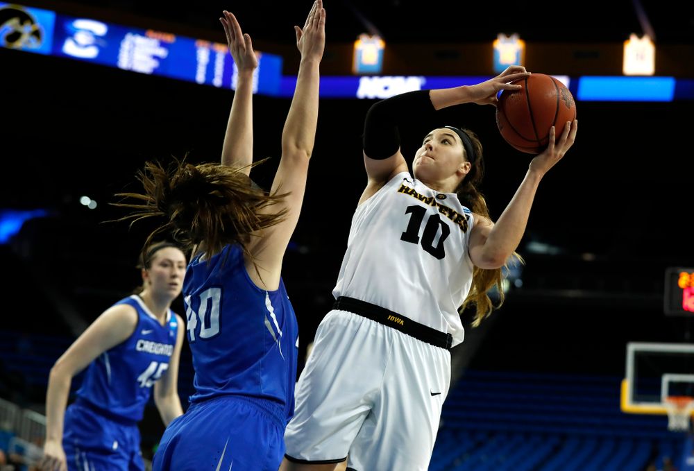 Iowa Hawkeyes forward Megan Gustafson (10) goes to the hoop against the Creighton Bluejays in the first round of the 2018 NCAA Women's Basketball Tournament Saturday, March 17, 2018 at Pauley Pavilion on the campus of UCLA. (Brian Ray/hawkeyesports.com)
