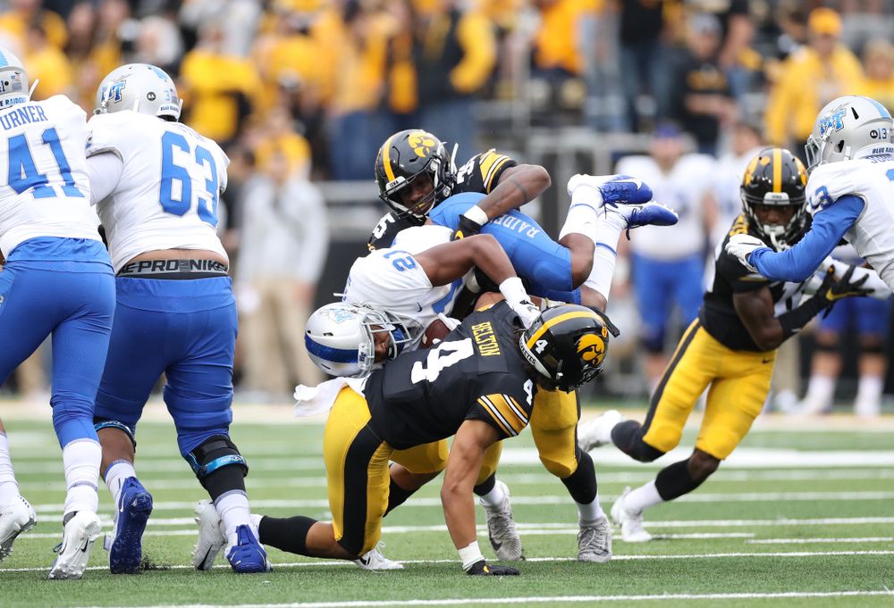 Iowa Hawkeyes linebacker Barrington Wade (35) and defensive back Dane Belton (4) against Middle Tennessee State Saturday, September 28, 2019 at Kinnick Stadium. (Max Allen/hawkeyesports.com)