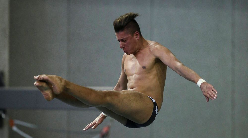 Iowa's Jonatan Posligua competes in the platform diving competition during the third day of the Hawkeye Invitational at the Campus Recreation and Wellness Center on November 17, 2018. (Tork Mason/hawkeyesports.com)