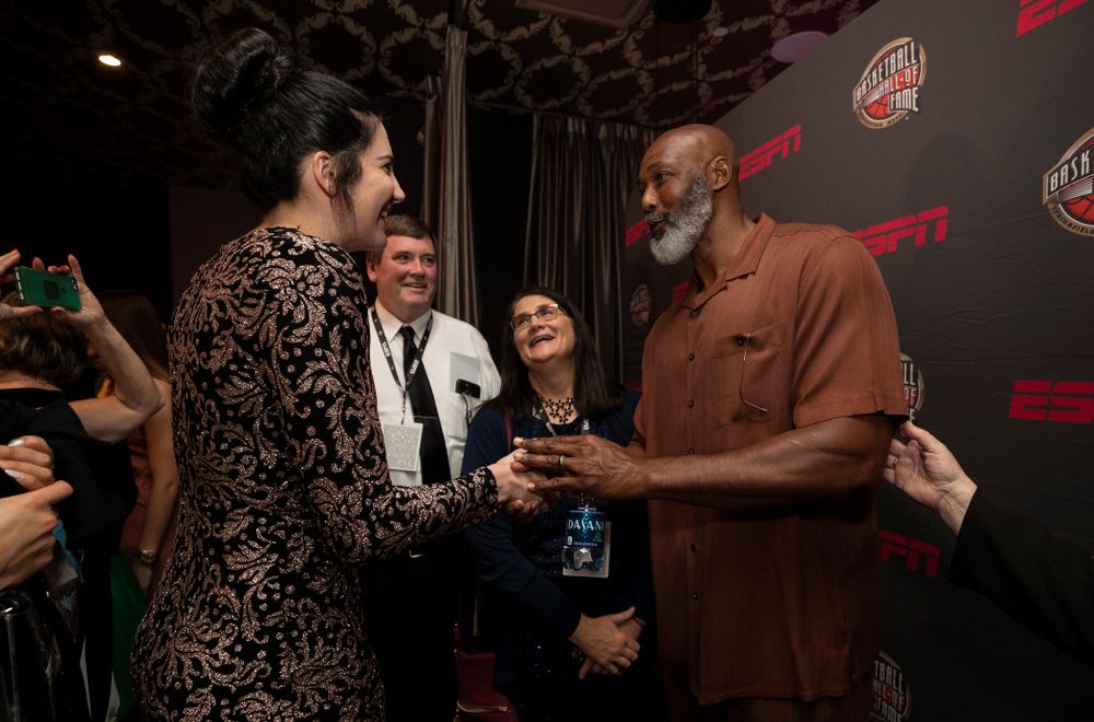 Iowa Hawkeyes forward Megan Gustafson (10) and her family with NBA great Karl Malone before the ESPN College Basketball Awards show Friday, April 12, 2019 at The Novo at LA Live.  (Brian Ray/hawkeyesports.com)