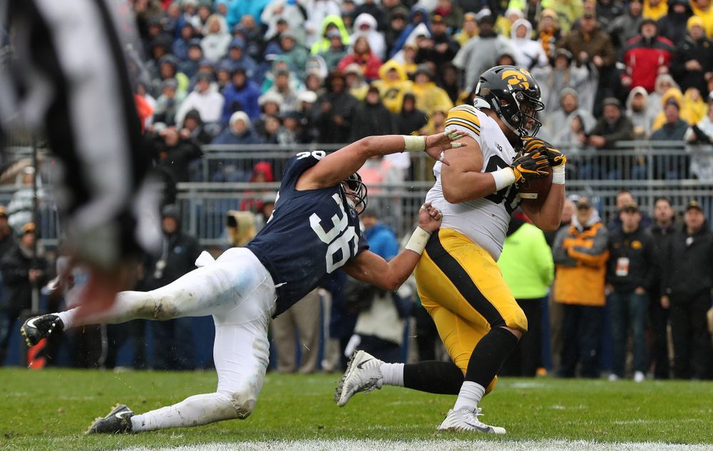 Iowa Hawkeyes defensive end Sam Brincks (90) catches a touchdown pass against the Penn State Nittany Lions Saturday, October 27, 2018 at Beaver Stadium in University Park, Pa. (Brian Ray/hawkeyesports.com)