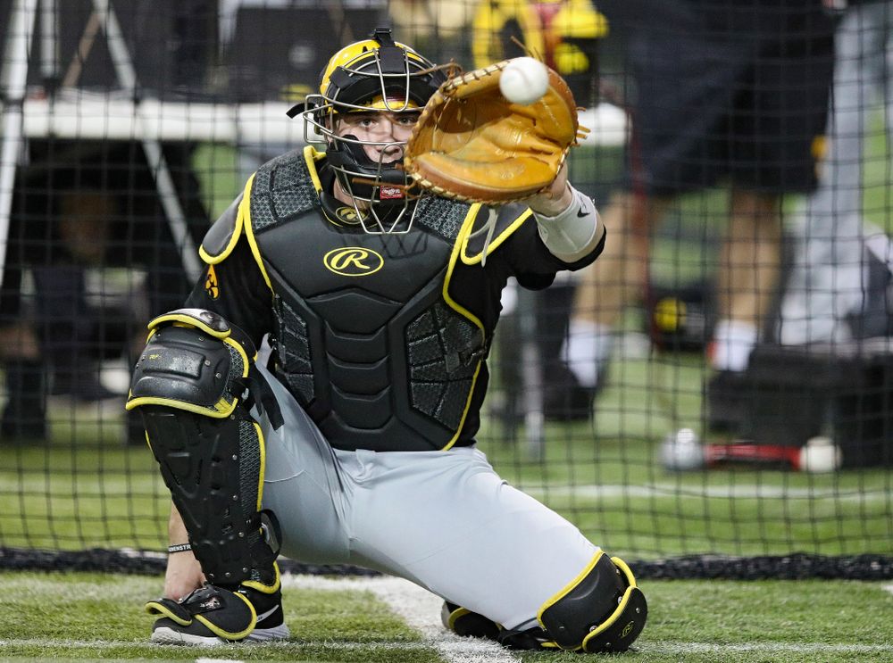 Iowa Hawkeyes catcher Austin Martin (34) looks in a pitch during practice at the Hansen Football Performance Center in Iowa City on Friday, January 24, 2020. (Stephen Mally/hawkeyesports.com)