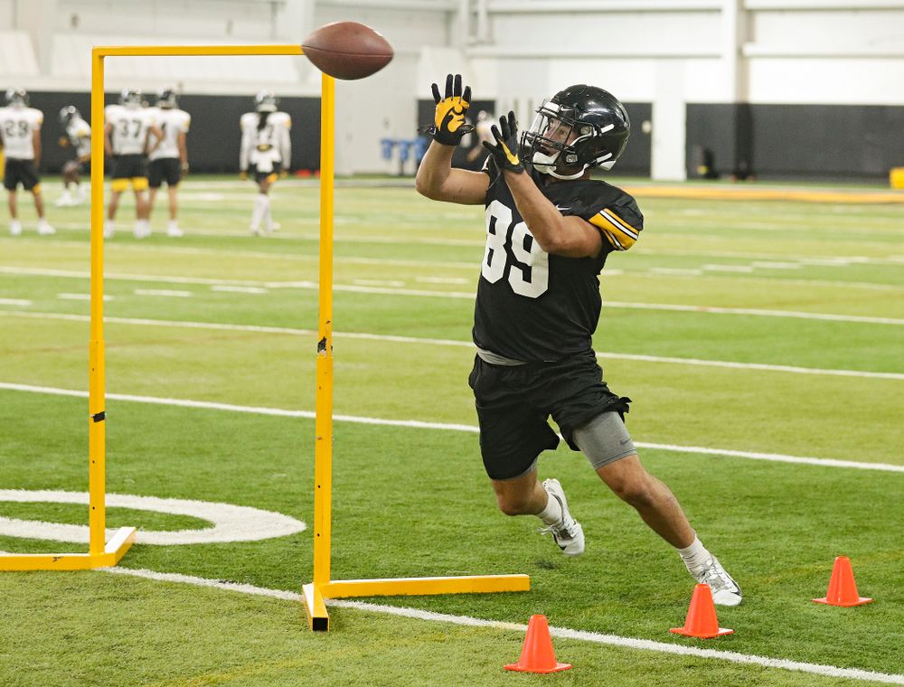 Iowa Hawkeyes wide receiver Nico Ragaini (89) pulls in a pass during Fall Camp Practice No. 9 at the Hansen Football Performance Center in Iowa City on Monday, Aug 12, 2019. (Stephen Mally/hawkeyesports.com)