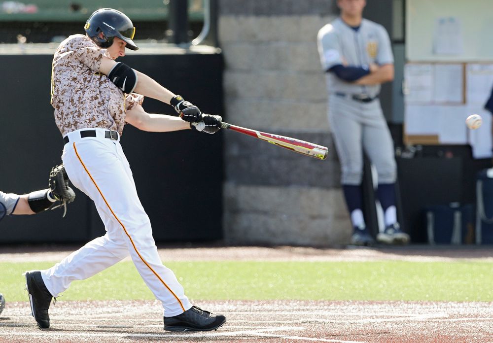 Iowa Hawkeyes right fielder Connor McCaffery (30) hits an RBI single during the eighth inning of their game against UC Irvine at Duane Banks Field in Iowa City on Sunday, May. 5, 2019. (Stephen Mally/hawkeyesports.com)