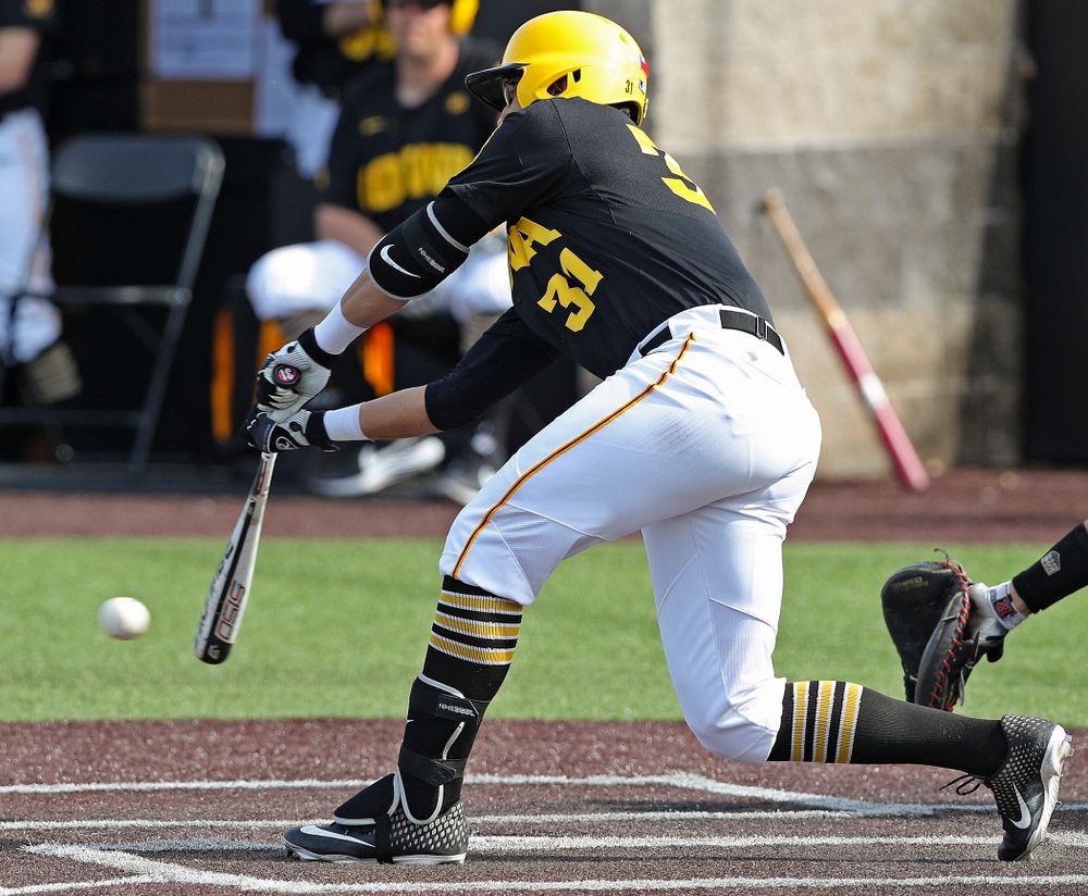 Iowa Hawkeyes third baseman Matthew Sosa (31) drives in a run with a hit during the sixth inning of their game against Rutgers at Duane Banks Field in Iowa City on Saturday, Apr. 6, 2019. (Stephen Mally/hawkeyesports.com)
