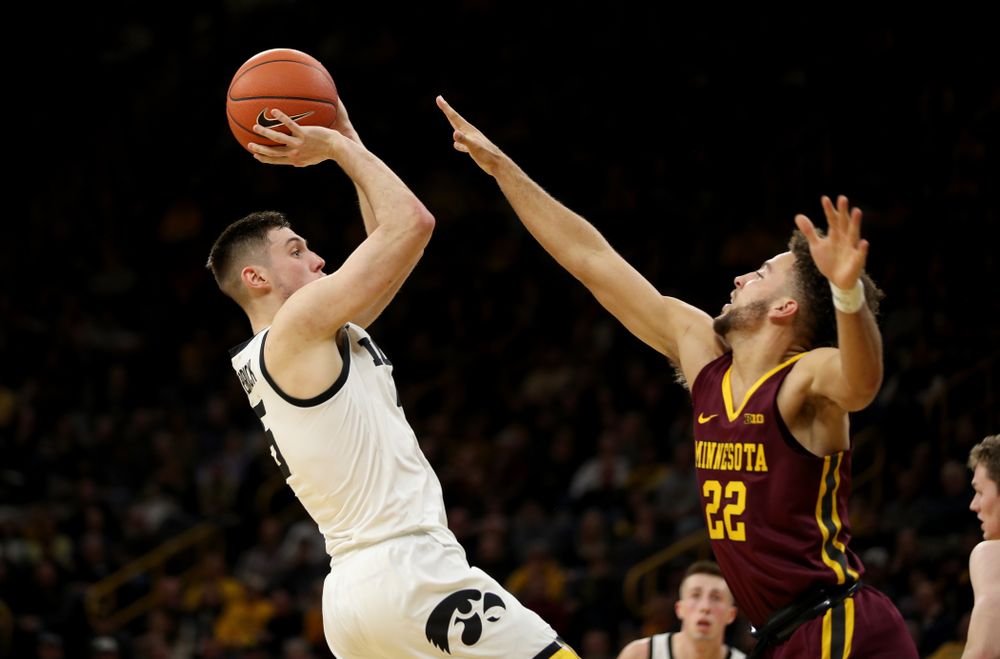 Iowa Hawkeyes guard CJ Fredrick (5) pulls up for a shot against the Minnesota Golden Gophers Monday, December 9, 2019 at Carver-Hawkeye Arena. (Brian Ray/hawkeyesports.com)