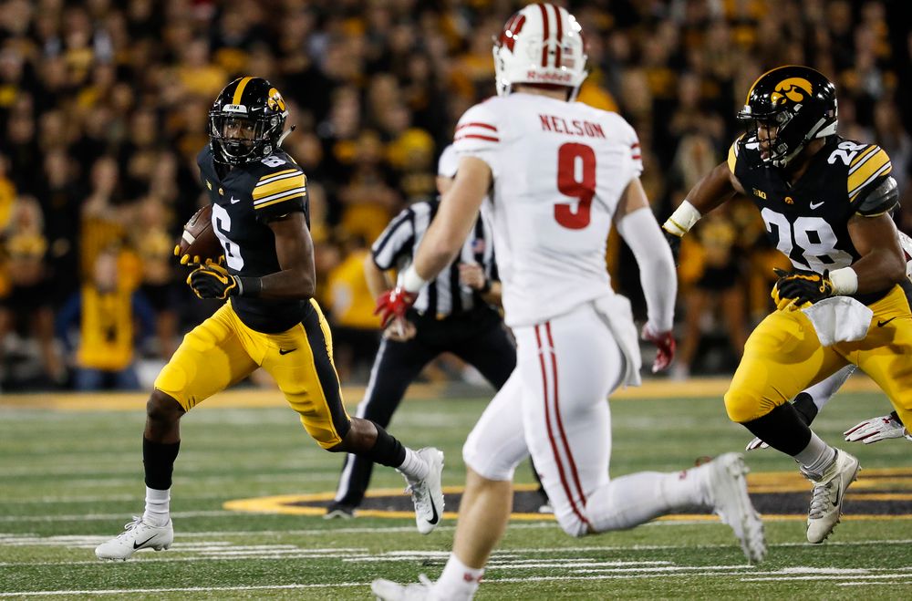 Iowa Hawkeyes wide receiver Ihmir Smith-Marsette (6) runs the ball during a game against Wisconsin at Kinnick Stadium on September 22, 2018. (Tork Mason/hawkeyesports.com)