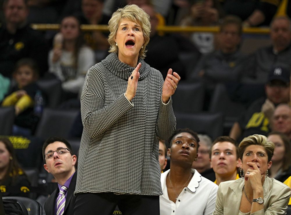 Iowa Hawkeyes head coach Lisa Bluder urges on her team during the third quarter of their game at Carver-Hawkeye Arena in Iowa City on Tuesday, December 31, 2019. (Stephen Mally/hawkeyesports.com)