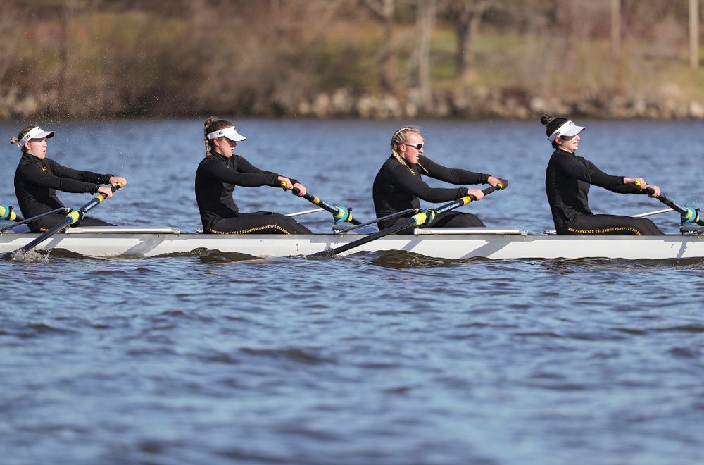 Iowa's Lauren Collier (from left), Noelle Ossenkop, Erika Davidson, and Riley Seufert during their I Novice 8 race against Wisconsin in their Big Ten Double Dual Rowing Regatta at Lake Macbride in Solon on Saturday, Apr. 13, 2019. (Stephen Mally/hawkeyesports.com)