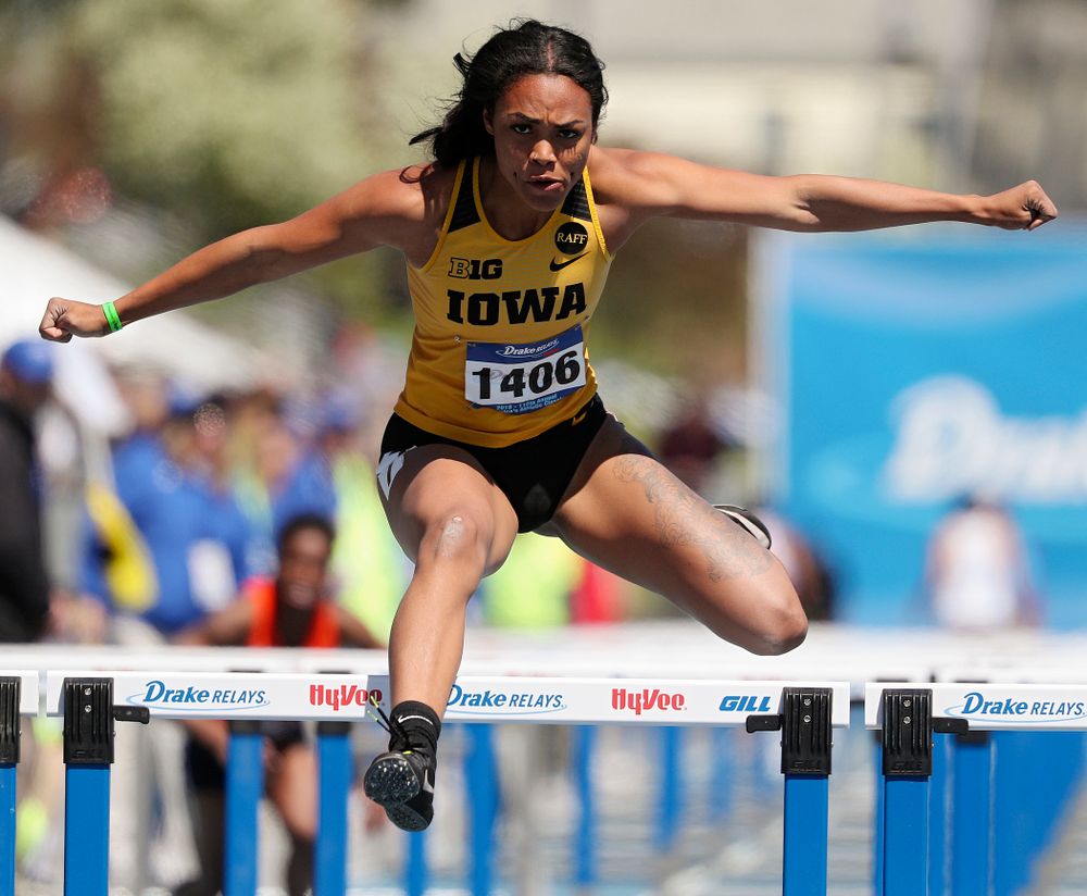 Iowa's Tria Simmons runs the women's 100 meter hurdles event during the second day of the Drake Relays at Drake Stadium in Des Moines on Friday, Apr. 26, 2019. (Stephen Mally/hawkeyesports.com)