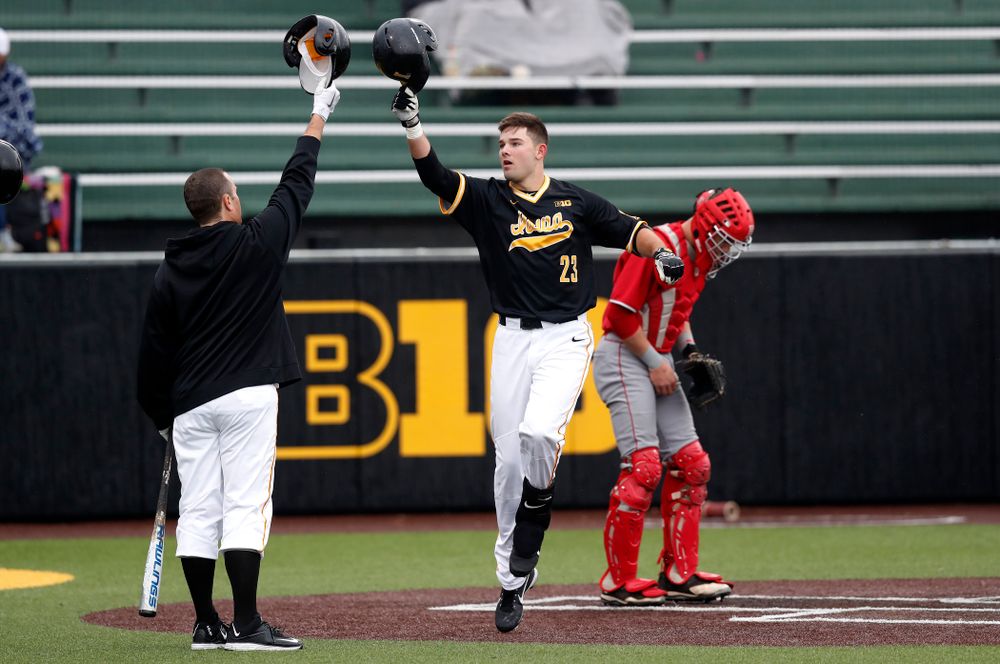 Iowa Hawkeyes infielder Kyle Crowl (23) celebrates after hitting a home-run against the Bradley Braves Wednesday, March 28, 2018 at Duane Banks Field. (Brian Ray/hawkeyesports.com)