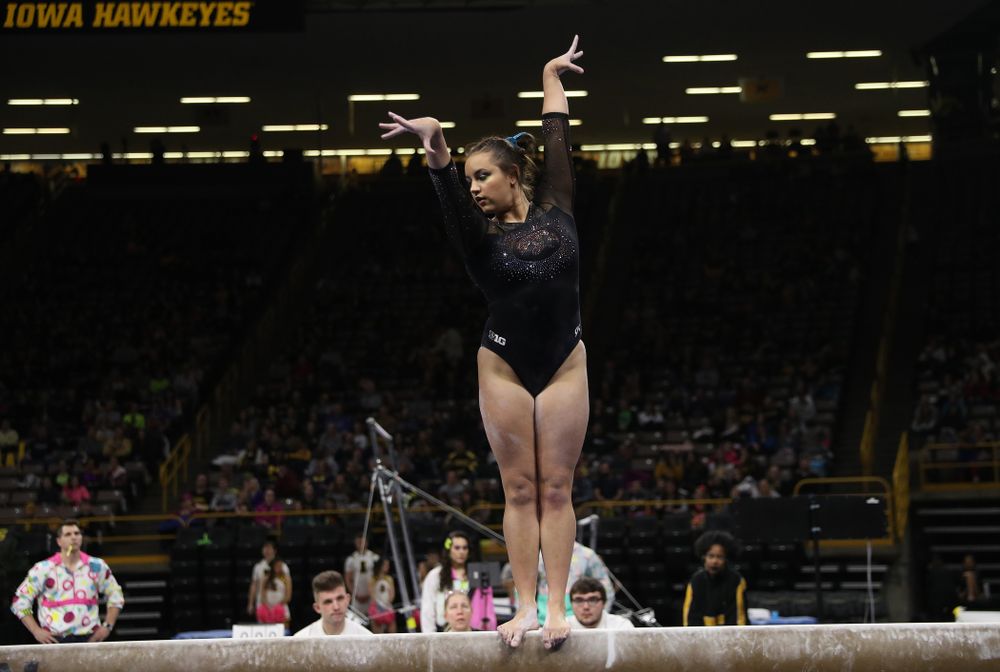 Iowa’s Dani Castillo competes on the beam against Michigan Friday, February 14, 2020 at Carver-Hawkeye Arena. (Brian Ray/hawkeyesports.com)