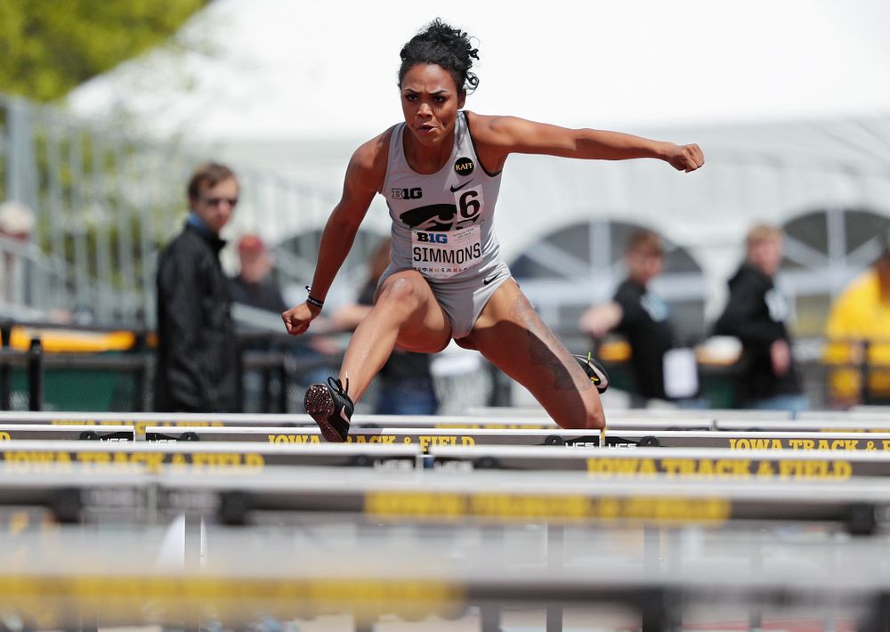 Iowa's Tria Simmons runs the 100 meter hurdles during the women's heptathlon event on the first day of the Big Ten Outdoor Track and Field Championships at Francis X. Cretzmeyer Track in Iowa City on Friday, May. 10, 2019. (Stephen Mally/hawkeyesports.com)