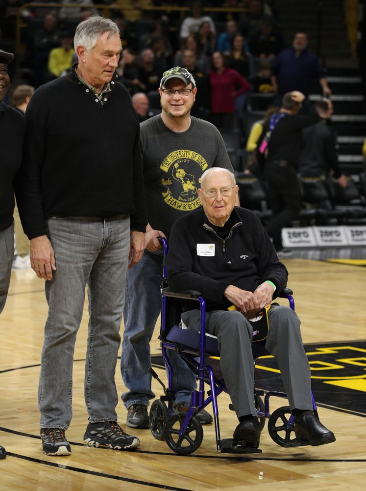 Former Iowa Hawkeye letterman Ned Postels is recognized during half-time against the Ohio State Buckeyes Saturday, January 12, 2019 at Carver-Hawkeye Arena. (Brian Ray/hawkeyesports.com)