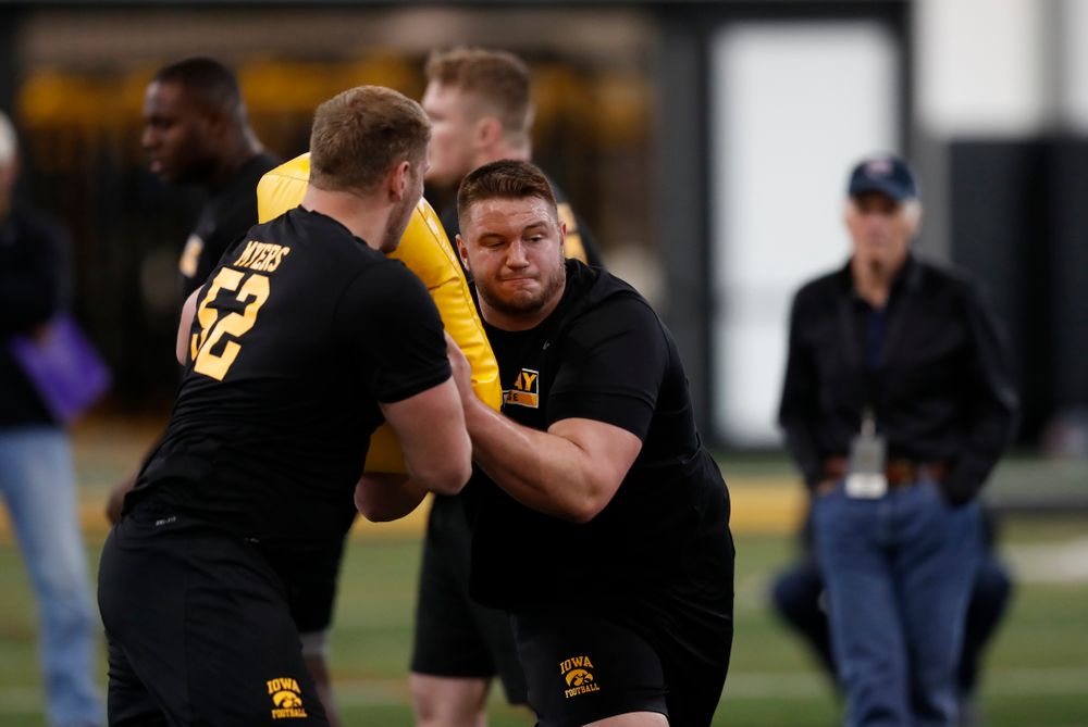 Iowa Hawkeyes offensive lineman Ike Boettger (75) and offensive lineman Boone Myers (52) during the team's annual pro day Monday, March 26, 2018 at the Hansen Football Performance Center. (Brian Ray/hawkeyesports.com)