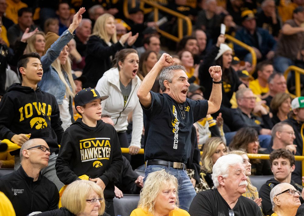 Iowa fans cheer on Kaleb Young in his 157-pound match during their dual at Carver-Hawkeye Arena in Iowa City on Friday, January 31, 2020. (Stephen Mally/hawkeyesports.com)