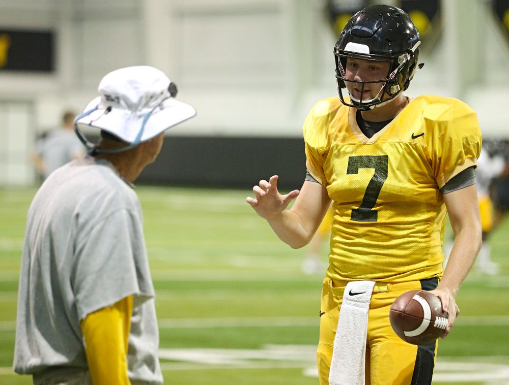 Iowa Hawkeyes quarterback Spencer Petras (7) talks with quarterbacks coach Ken O'Keefe during Fall Camp Practice No. 6 at the Hansen Football Performance Center in Iowa City on Thursday, Aug 8, 2019. (Stephen Mally/hawkeyesports.com)