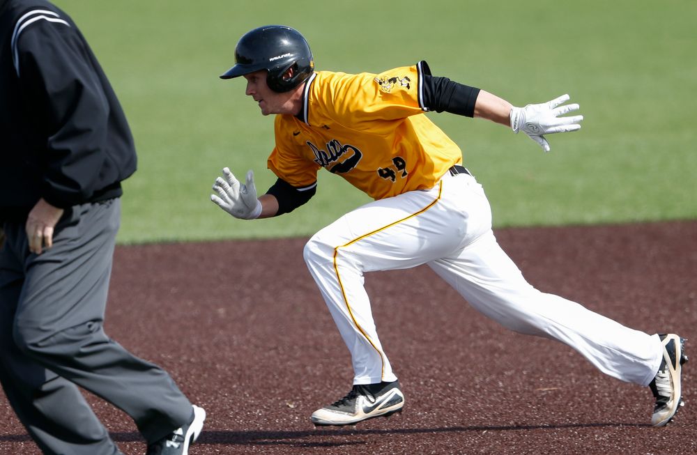 Iowa Hawkeyes outfielder Robert Neustrom (44) runs to second base during a game against Evansville at Duane Banks Field on March 18, 2018. (Tork Mason/hawkeyesports.com)