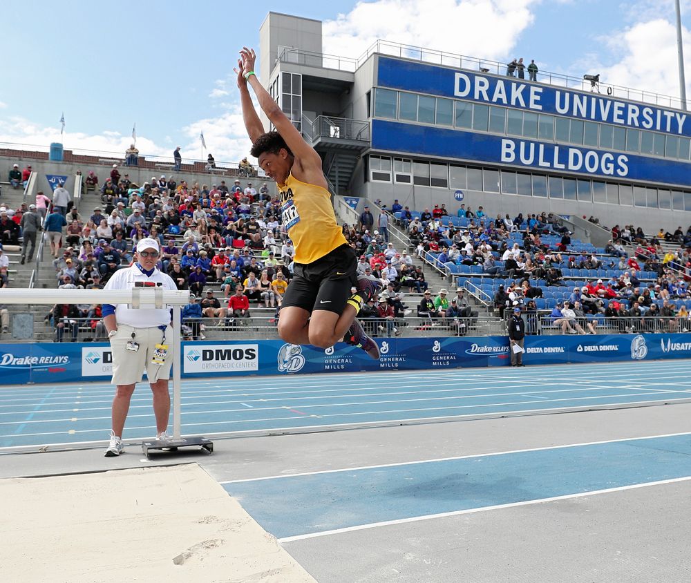 Iowa's James Carter makes a jump in the men's triple jump event during the second day of the Drake Relays at Drake Stadium in Des Moines on Friday, Apr. 26, 2019. (Stephen Mally/hawkeyesports.com)