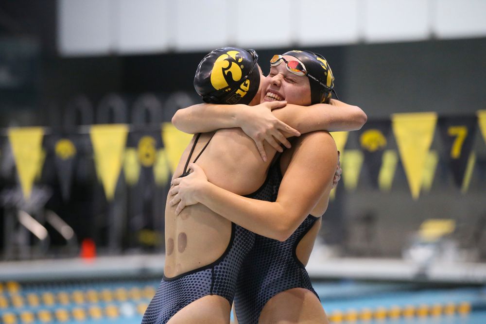 Aleksandra Olesiak and Julia Koluch during Iowa women’s swimming and diving vs Rutgers on Friday, November 8, 2019 at the Campus Wellness and Recreation Center. (Lily Smith/hawkeyesports.com)
