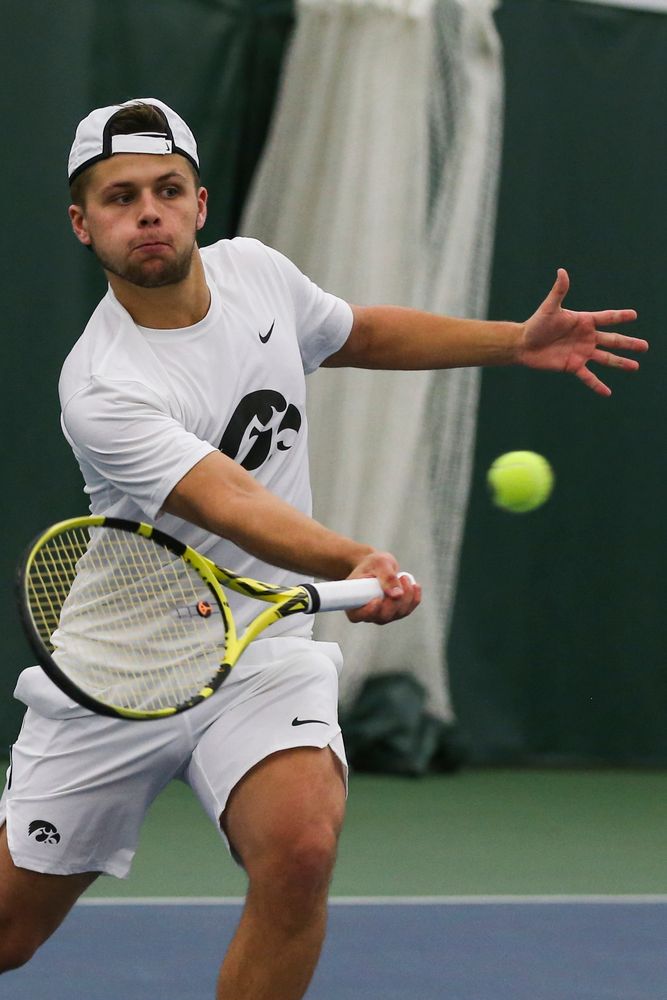 Iowa’s Will Davies hits a forehand during the Iowa men’s tennis match vs Western Michigan on Saturday, January 18, 2020 at the Hawkeye Tennis and Recreation Complex. (Lily Smith/hawkeyesports.com)