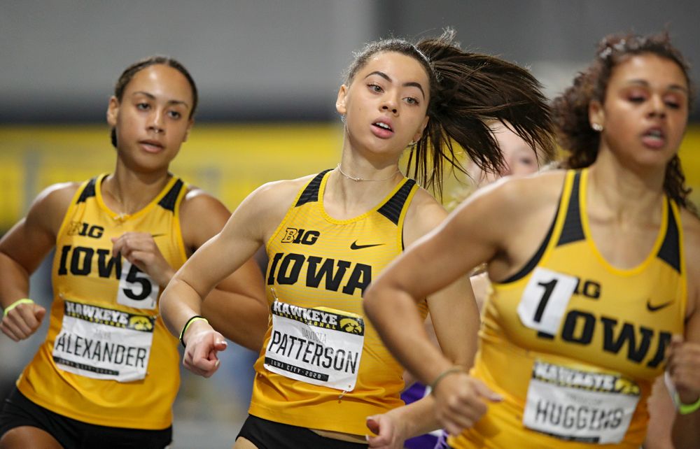 Iowa’s Davicia Patterson (center) runs the women’s 600 meter run event between Anaya Alexander (left) and Dallyssa Huggins during the Hawkeye Invitational at the Recreation Building in Iowa City on Saturday, January 11, 2020. (Stephen Mally/hawkeyesports.com)