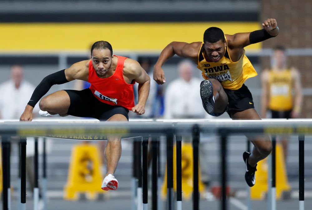 Aaron Mallett and Anthony Williams compete in 60 meter high hurdles 