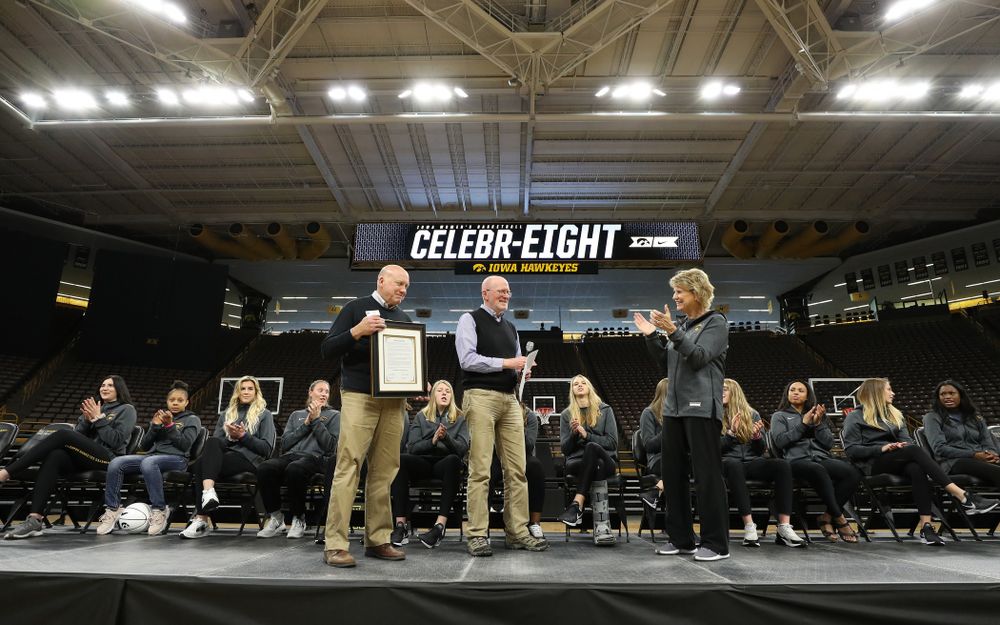Iowa City Mayor Jim Throgmorton and Coralville Mayor John Lundell present Iowa Hawkeyes head coach Lisa Bluder with a joint proclamation designating April 24, 2019 as Iowa WomenÕs Basketball Day during the teamÕs Celebr-Eight event Wednesday, April 24, 2019 at Carver-Hawkeye Arena. (Brian Ray/hawkeyesports.com)