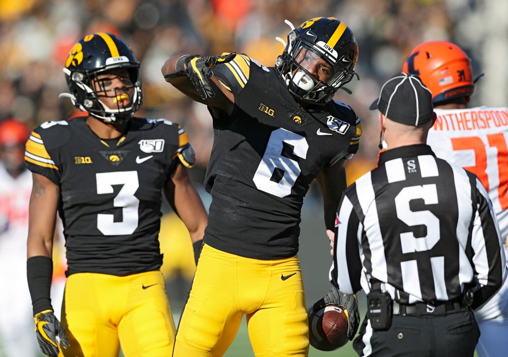 Iowa Hawkeyes wide receiver Ihmir Smith-Marsette (6) signals first down after pulling in a pass during the third quarter of their game at Kinnick Stadium in Iowa City on Saturday, Nov 23, 2019. (Stephen Mally/hawkeyesports.com)