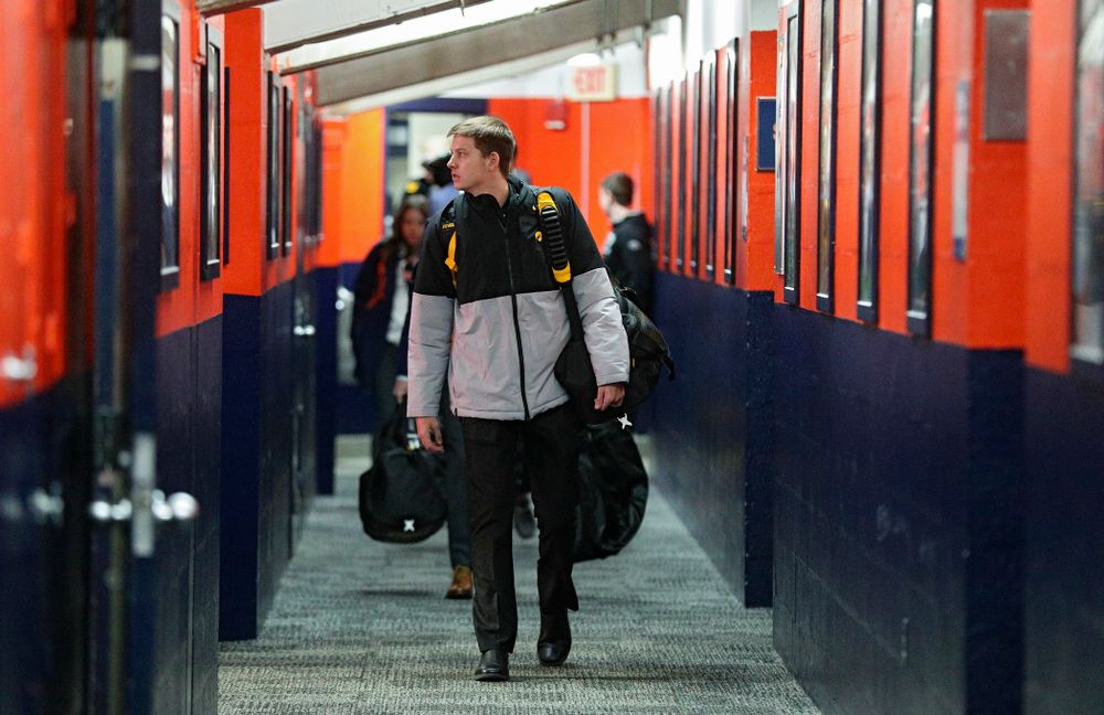 Iowa Hawkeyes guard Austin Ash (13) walks to the locker room as the team arrives before their ACC/Big Ten Challenge game at the Carrier Dome in Syracuse, N.Y. on Tuesday, Dec 3, 2019. (Stephen Mally/hawkeyesports.com)