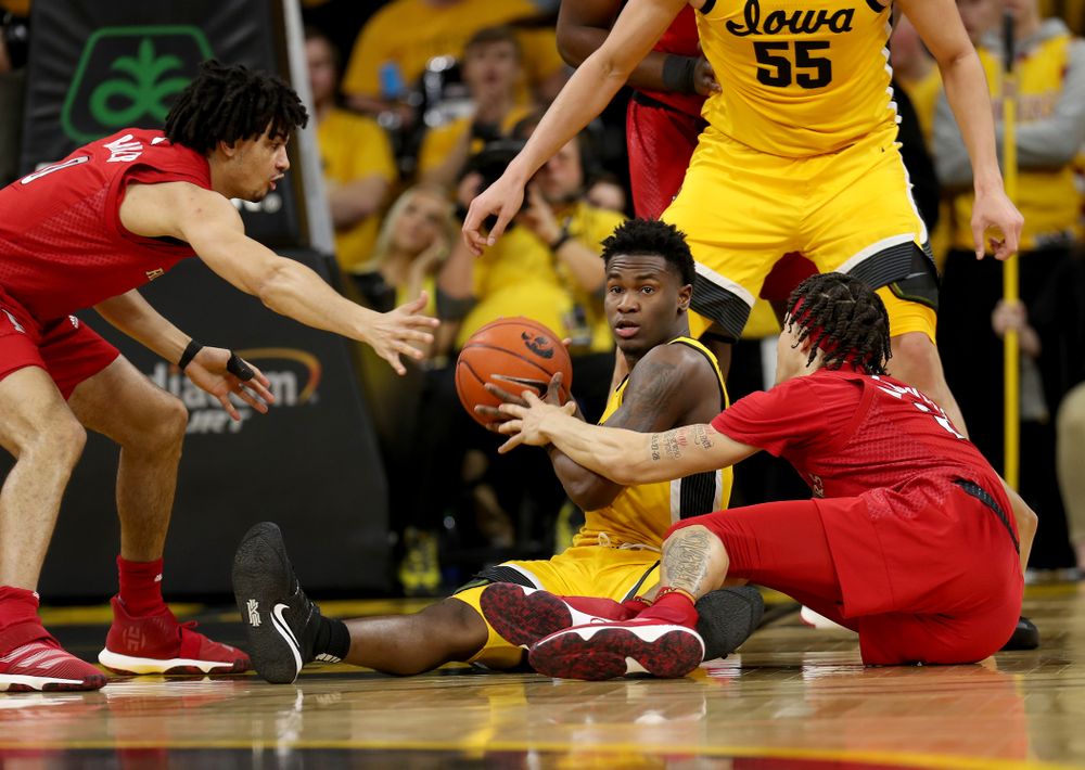Iowa Hawkeyes guard Joe Toussaint (1) collects a loose ball against the Rutgers Scarlet Knights  Wednesday, January 22, 2020 at Carver-Hawkeye Arena. (Brian Ray/hawkeyesports.com)