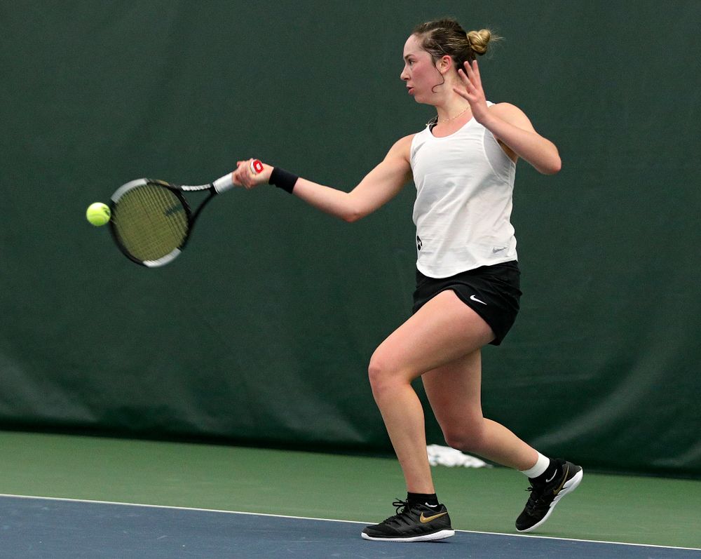Iowa’s Samantha Mannix returns a shot during her singles match at the Hawkeye Tennis and Recreation Complex in Iowa City on Sunday, February 23, 2020. (Stephen Mally/hawkeyesports.com)