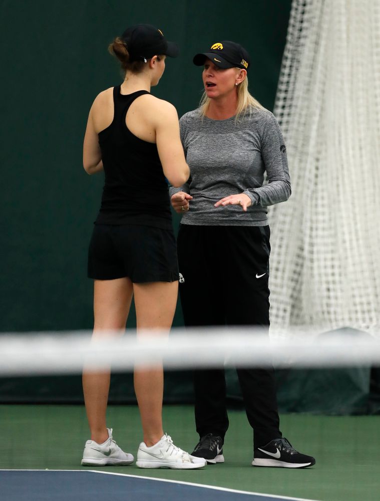 Elise Van Heuvelen and head coach Sasha Schmid against Ohio State Sunday, March 25, 2018 at the Hawkeye Tennis and Recreation Center. (Brian Ray/hawkeyesports.com)