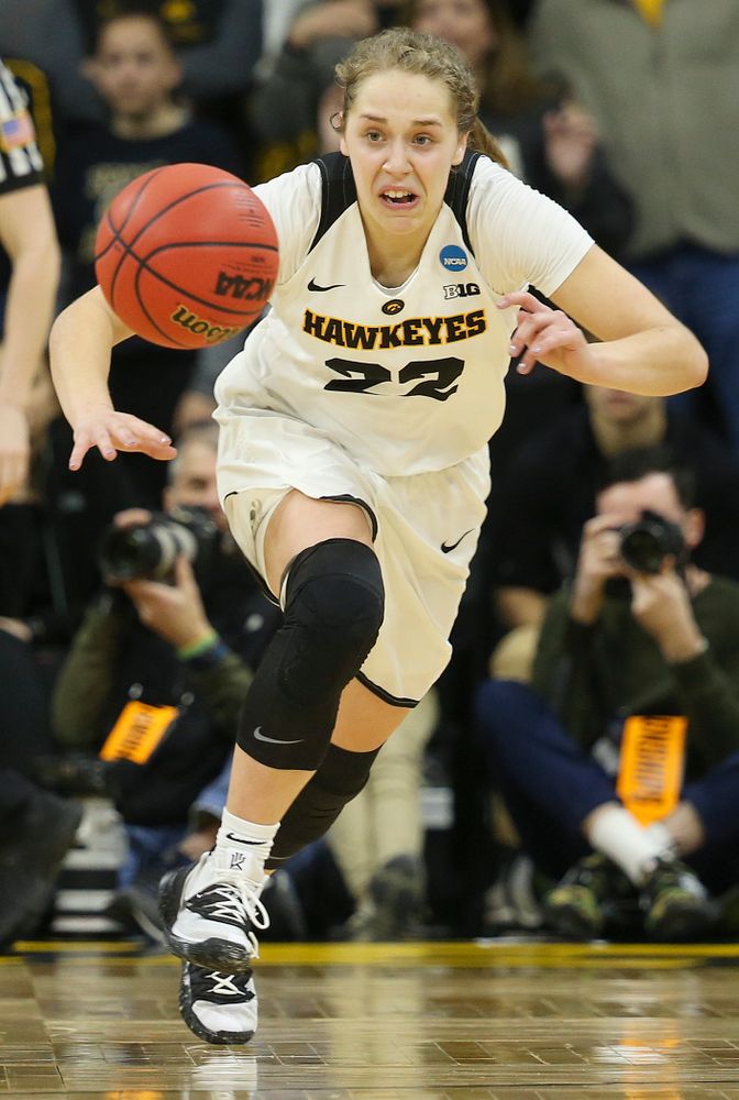 Iowa Hawkeyes guard Kathleen Doyle (22) gets a steal during the fourth quarter of their second round game in the 2019 NCAA Women's Basketball Tournament at Carver Hawkeye Arena in Iowa City on Sunday, Mar. 24, 2019. (Stephen Mally for hawkeyesports.com)