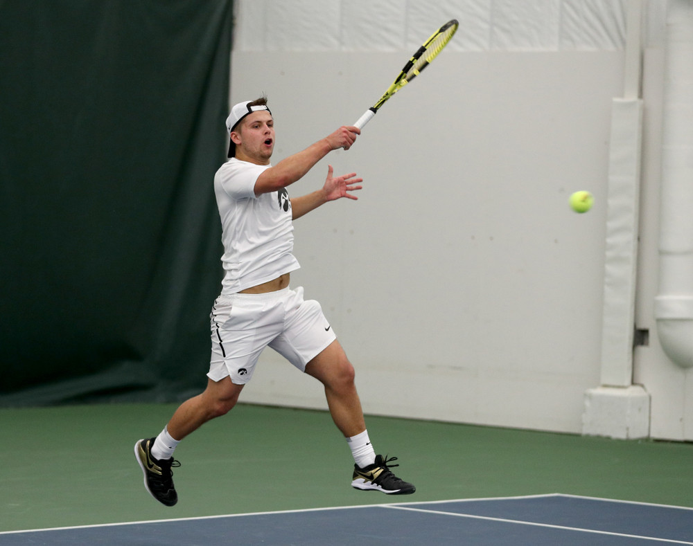 Iowa’s Will Davies against Cornell Sunday, March 8, 2020 at the Hawkeye Tennis and Recreation Center. (Brian Ray/hawkeyesports.com)