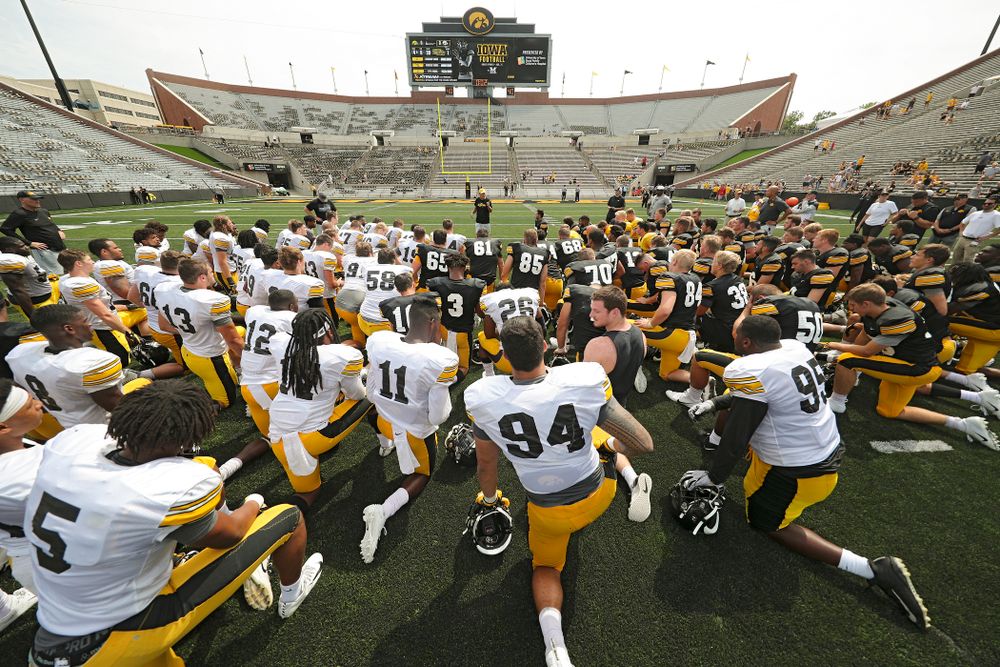 Iowa Hawkeyes head coach Kirk Ferentz talks with his team at the end of Fall Camp Practice No. 8 at Kids Day at Kinnick Stadium in Iowa City on Saturday, Aug 10, 2019. (Stephen Mally/hawkeyesports.com)