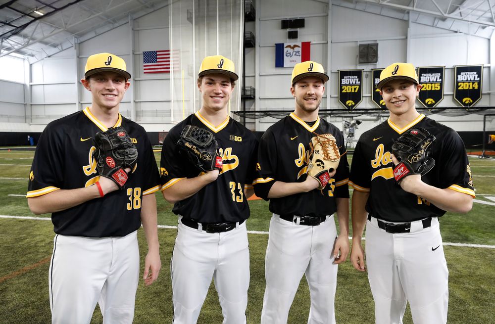 Iowa Hawkeyes pitcher Trenton Wallace (38), pitcher Jack Dreyer (33), pitcher Cam Baumann (35), and pitcher Ben Probst (19) Thursday, February 8, 2018 during the team's annual media day Thursday, February 8, 2018 in the indoor practice facility. (Brian Ray/hawkeyesports.com)