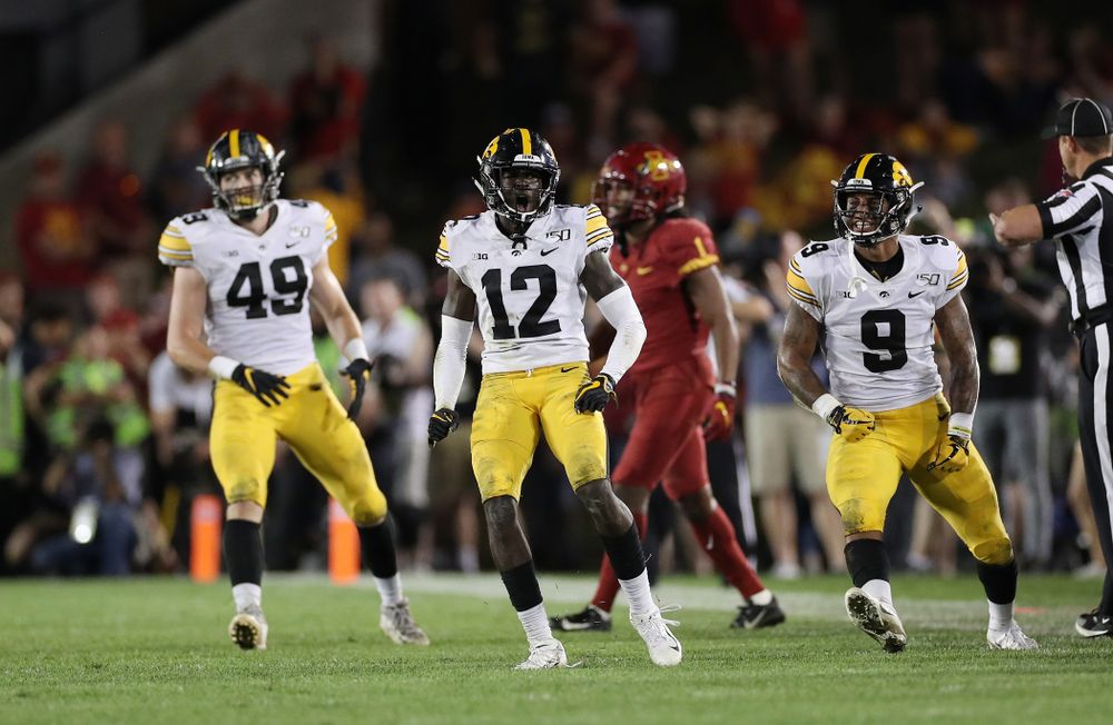 Iowa Hawkeyes defensive back D.J. Johnson (12) celebrates after breaking up a pass against the Iowa State Cyclones Saturday, September 14, 2019 in Ames, Iowa. (Brian Ray/hawkeyesports.com)